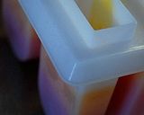 A picture of step 7 of Rainbow Popsicles.