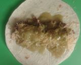 A picture of step 11 of Pork Roast Enchiladas.