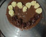 A picture of step 10 of Bourbon biscuits cake.