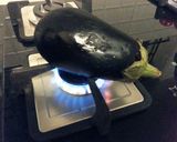 A picture of step 1 of Baigan Bharta / Brinjal (Eggplant) Chutney ( వంకాయ పచ్చడి ).