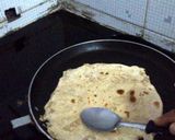 A picture of step 8 of aloo parathas.
