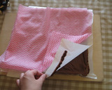 A picture of step 10 of Moist Cocoa Roll Cake.