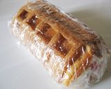 A picture of step 12 of Fluffy Waffle Roll Cake.