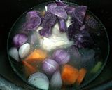 A picture of step 2 of Black Potato In Chicken Soup.