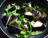 A picture of step 4 of Eggplant and Green Bell Pepper Stir-fry with Sweet and Spicy Walnut Miso Sauce.