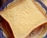 A picture of step 2 of Toast with Ham, Tomatoes, and Cheese.