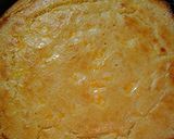 A picture of step 4 of Cheesy cornbread in a cast iron pan.