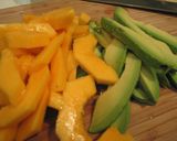 A picture of step 4 of Papaya Avocado and Tomato Salad.