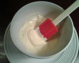 A picture of step 3 of White Chocolate Cupcakes with White Chocolate Whipped Cream Frosting.