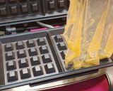 A picture of step 4 of Finally Found a Use for Rice Paper! Cheesy Waffles 🧀.