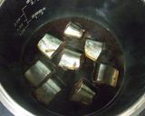 A picture of step 12 of "Boneless" Pacific Saury or Sardines in Sweet-Salty Sauce (Kanroni) Cooked in a Pressure Cooker.