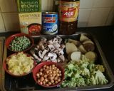 A picture of step 1 of Broccoli, Mushroom, Potato, Peas & Chickpea Curry (Vegan/Veg).