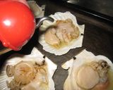 A picture of step 11 of Scallops With Butter and Soy Sauce Baked in Their Shells.