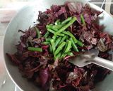 A picture of step 2 of Indo-Thai Style Sautéed Red Amarnath with Beans.