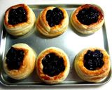 A picture of step 11 of Blueberry No-Bake Cheese Pies.