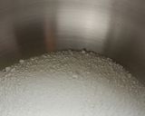 A picture of step 2 of Chewy and Moist "Pon-de-Ring" Doughnuts.
