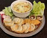 The Ultimate Crab and Artichoke Dip recipe step 14 photo