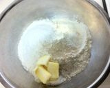 A picture of step 1 of Fluffy and Springy White Bread Made Easily in a Bowl.