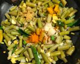 A picture of step 2 of Cheesy Baked Green Beans.