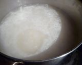 A picture of step 3 of Cooking Rice in a Pot Without it Boiling Over.