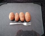 A picture of step 1 of Shoestring potato cake.