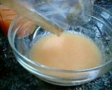 A picture of step 2 of Jiggly Grapefruits Jello.