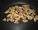A picture of step 2 of Tazukuri with Walnuts.