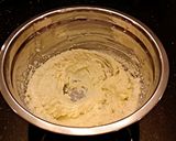 A picture of step 2 of Toasted Coconut Caramel Cashew Bars.
