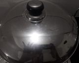 A picture of step 4 of Choco Idli Muffins by Oreo biscuits.