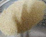 A picture of step 1 of Daliya couscous with curry leaf pesto crusted potatoes.
