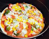 A picture of step 3 of Tortilla pizza.