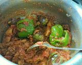 A picture of step 1 of Vangi shimla mirch masala bhaji.