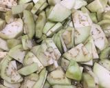 A picture of step 1 of Alu baigan.