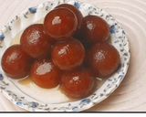 A picture of step 5 of Marie biscuits ke gulab jamun.