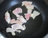 A picture of step 1 of Japanese Leek, Chicken Thigh, and Bonito Flake Stir-Fry.