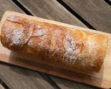 A picture of step 18 of Italian Roll Cake.