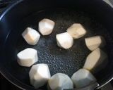 A picture of step 1 of Creamy and Starchy Taro Root Croquettes with Ham and Cheese.