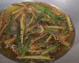 A picture of step 3 of Kurkuri Bhindi.