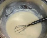 A picture of step 2 of Cheese Steamed Bread with Pancake Mix in a Frying Pan.
