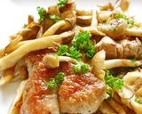 A picture of step 7 of Tender Pork Tenderloin and Mushrooms Sautéed in Butter.