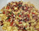 A picture of step 7 of "Brekkie" Tatos.