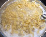 A picture of step 1 of Cheesy Buttered Egg Noodles.