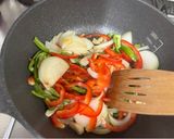 A picture of step 2 of Pork Belly and Vegetables Fry with much Peppers.