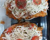 Foto del paso 4 de la receta Berenjenas rellenas con pisto y pollo, gratinadas