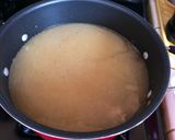A picture of step 4 of Chicken Arroz Caldo.