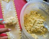 A picture of step 6 of Bourbon barbecue chicken lasagna roll ups.