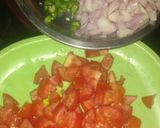 A picture of step 1 of Potato boat loaded with paneer bhurji in green peas gravy.