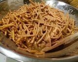 A picture of step 3 of Butterscotch & Peanut Butter Chinese Noodle "Spider" Cookies.