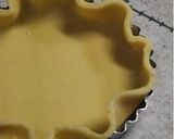 A picture of step 11 of How to Blind-Bake Pate a Fonce & Tart Crusts.