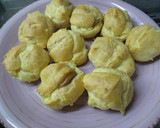 Foto del paso 10 de la receta: Bombas rellenas de dulce de leche y baño de chocolate